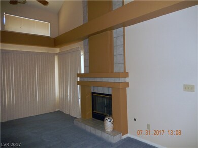 Living room features impressive gas fireplace, vau