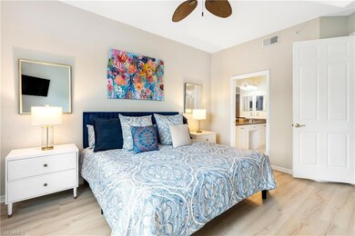 Bedroom with ceiling fan, connected bathroom, and 