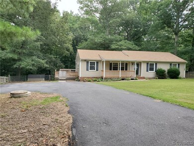 Expansive front yard and double width paved drivew