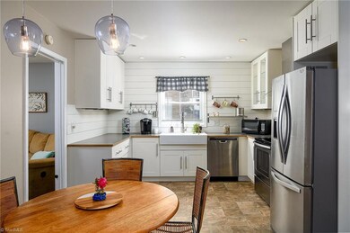 View of kitchen from breakfast area