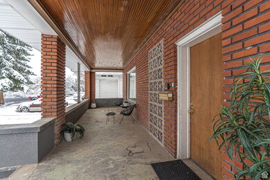 View of patio with a porch