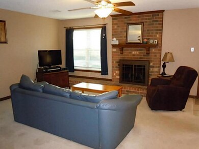 Large great room with fireplace and large hearth f