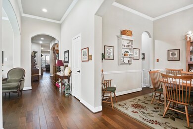 The Foyer entryway offers on your left the Home Office. Also as you can see, a very spacious Formal Dining room for those grand or intimate celebrations both offer front yard views.