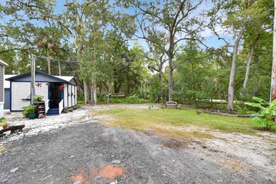 View of yard featuring an outdoor structure