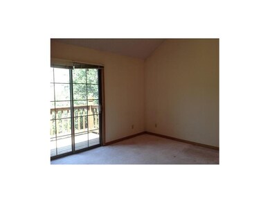 Master bedroom main level overlooks deck