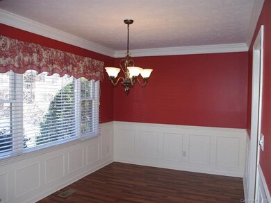 dining room with crown/wainscoting