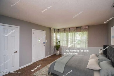 8858 Atter Ln, Jacksonville, FL 32216 - photo 3