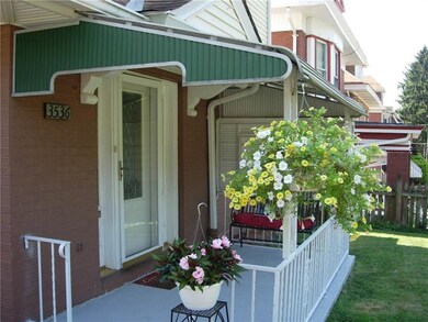 Covered front porch is concrete. Welcome to 3536 D