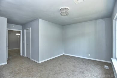 Great Room or Office Space, leads to laundry room