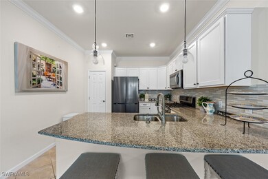 Kitchen featuring stainless steel appliances, a pe