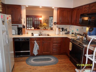 Custom cabinetry pass through bar