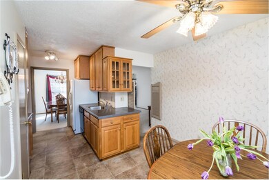 Open Kitchen with custom 42 inch Oak Cabinets, pan