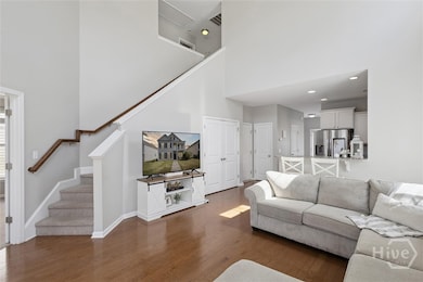 Three HUGE bedrooms and the second bath are located at the top of the stairway.