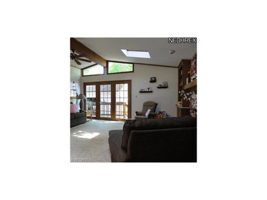 Family room with center door to deck