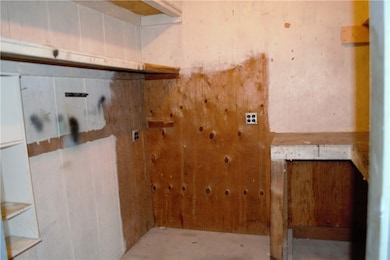 Built-in storage shed in carport