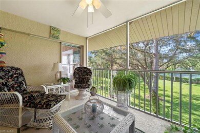 Sunroom with outdoor dining area and a ceiling fan