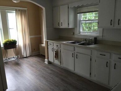 Sweet kitchen with new vinyl floors