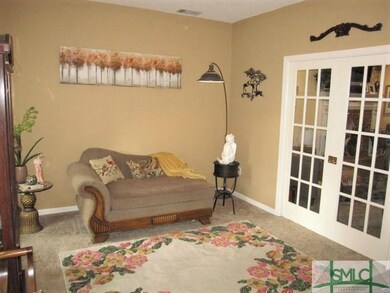 Perfect study set off the foyer with sliding Frenc