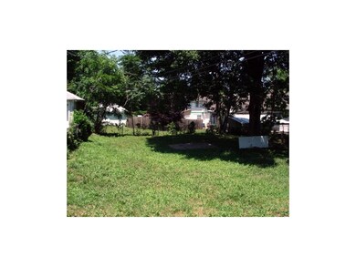 The view of a large back yard from the decks