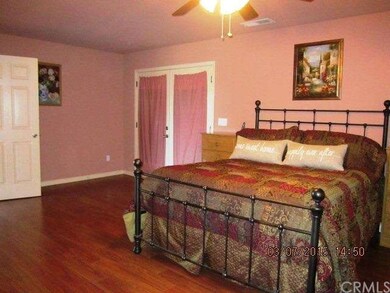 master bedroom French doors access the pool and sp