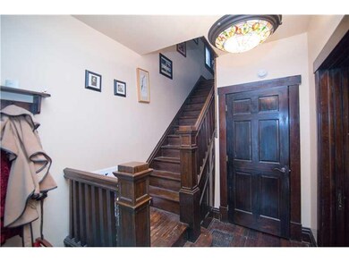 Entry/Foyer. Entry has original pocket door closur