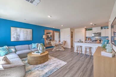 Living area with light wood finished floors, visib