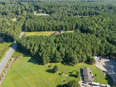 Drone / aerial view of a heavily wooded area