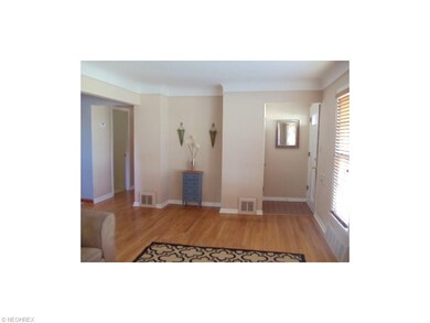 LIVING ROOM ALSO OFFERS A NICHE WITH CHARACTER, AN