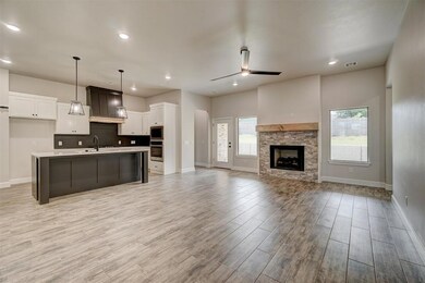 Kitchen featuring light hardwood / wood-style floo