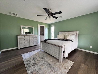 The master bedroom has been upgraded with new luxury vinyl tile, delivering both sophistication and durability. This elegant flooring choice not only enhances the aesthetic appeal of the room but also offers exceptional wear resistance, making it ideal for a space that blends comfort with style.