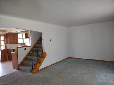 Spacious Living room, opening to the kitchen.