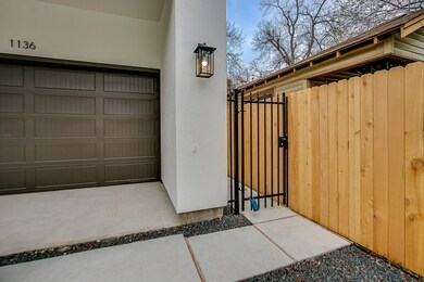 Private drive and wrought iron entry gate. Photos