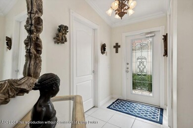 03_7791PineIslandWay_32_Foyer_Small
