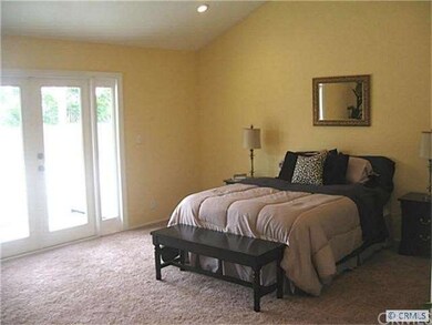 Huge Master bedroom, with French doors leading to 