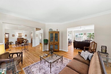 Real hardwood flooring through the majority of the