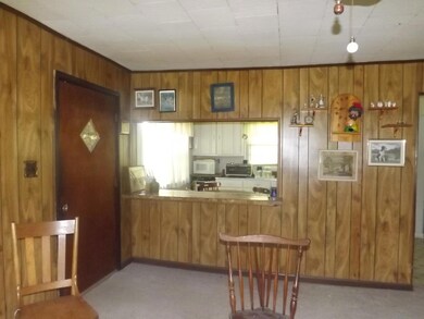 There is a convenient pass through to the kitchen from the living room.