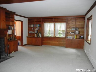 Living Room spacious living room with wood fire pl