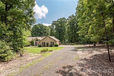 Property is surrounded by woods, offering both qui