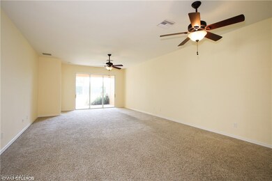 Large Living Room with 3 Pane Slider out to Screen