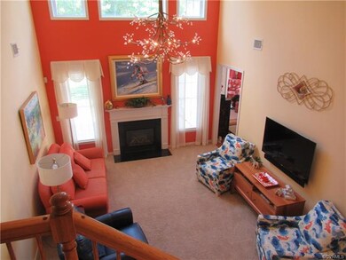 FAMILY ROOM FROM STAIRWAY