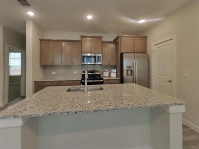 Kitchen featuring stainless steel appliances, an 