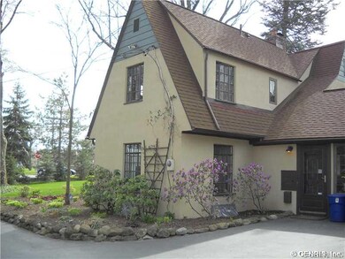 Exterior Front. Initial Spring plantings beginning