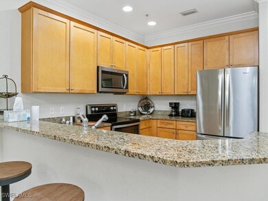Kitchen with appliances with stainless steel finis