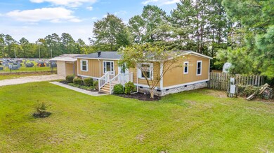 View of front of home featuring a front lawn