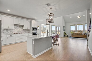 Kitchen featuring stainless steel appliances, ple