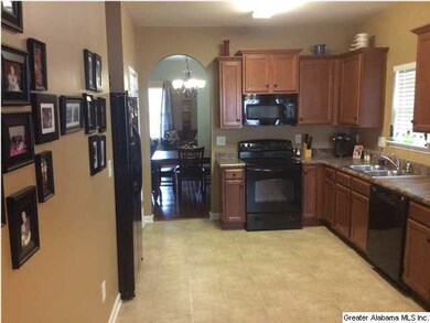 Black refrigerator negotiable with purchase of hom