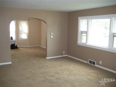 Dining room through the living room archway good s
