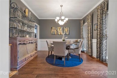 Beautiful remodeled dining room with custom moldin