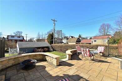 Expansive custom stone patio out back!
