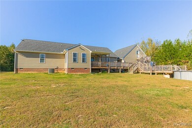 Rear view of property featuring cooling unit, a la